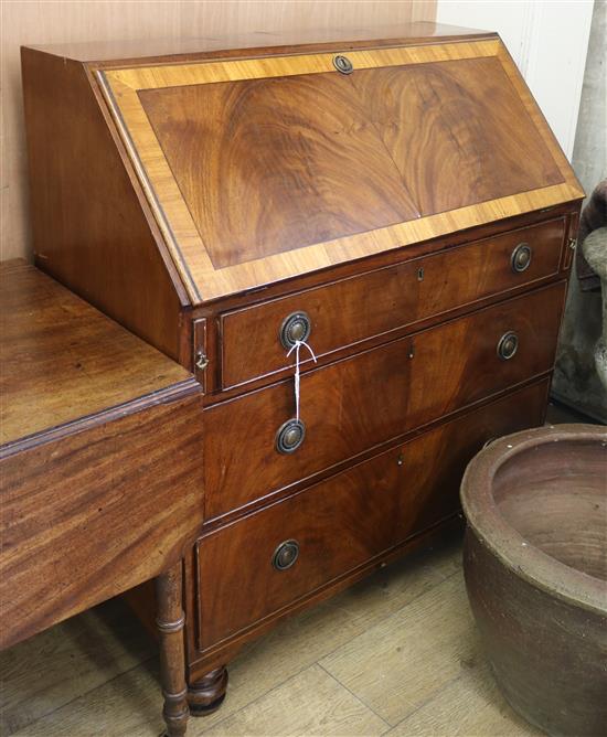 A late George III satinwood banded mahogany bureau W.90cm